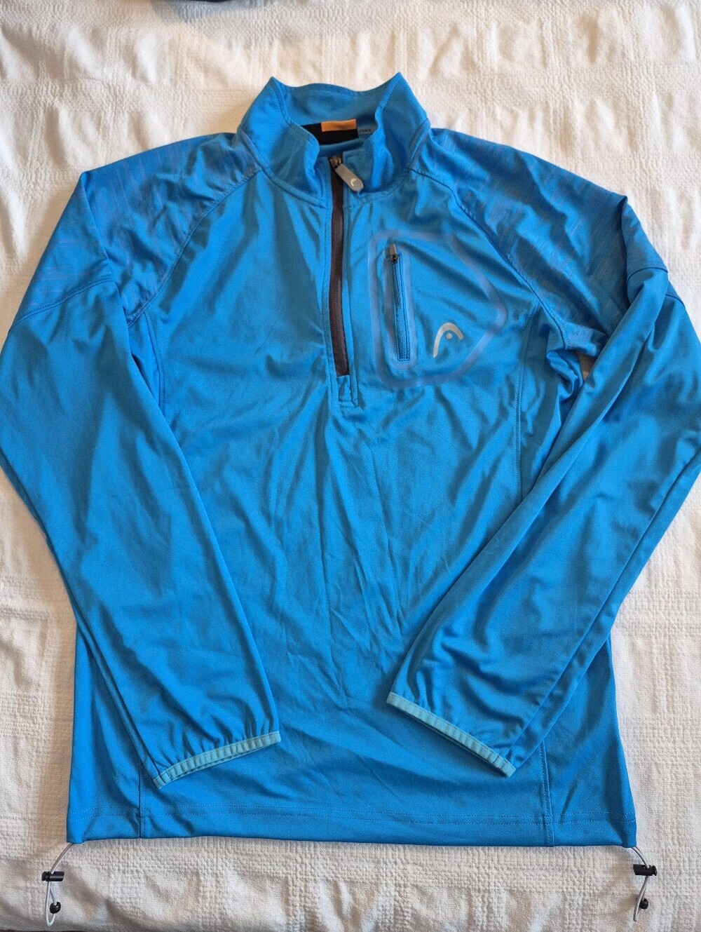 Head men's Medium 1/4 zip lt blue pullover running shirt, waist toggles EUC